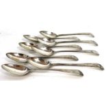 A group of eight Georgian Old English teaspoons with bright cut decoration, six hallmarked for