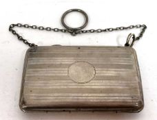 A George V card case with banded engine turned decoration with chain and ring handle, Chester