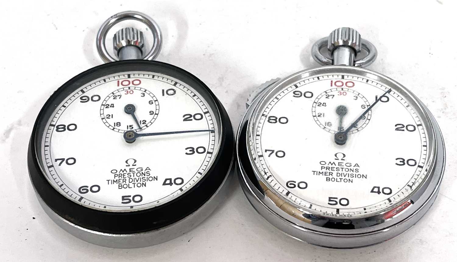 Two Omega Stopwatches, both have manually crown wound movements with white dials and contrasting
