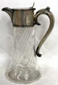 Victorian silver mounted claret jug with clear glass wrythen shaped body, plain silver mount and