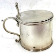 A George III silver drum mustard of plain form, the hinged lid engraved "Mustard", with pierced