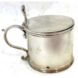 A George III silver drum mustard of plain form, the hinged lid engraved "Mustard", with pierced