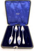 A cased part set of four hallmarked silver grapefruit spoons, London 1913, makers mark for Josiah