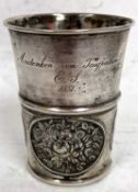 An Austrian silver goblet of tapering cylindrical form, the top half of the plain goblet engraved