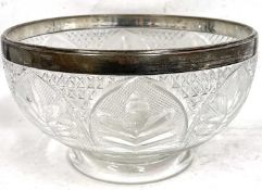 An early 20th Century cut glass salad bowl with hallmarked silver rim, Sheffield 1901, makers mark
