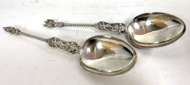 A pair of large apostle spoons, import marked for London 1892, makers mark for Soloman Nathan