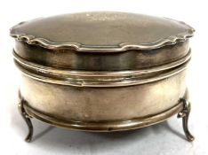 George V silver ring box of circular form, the hinged lid applied with a wavey rim and engraved