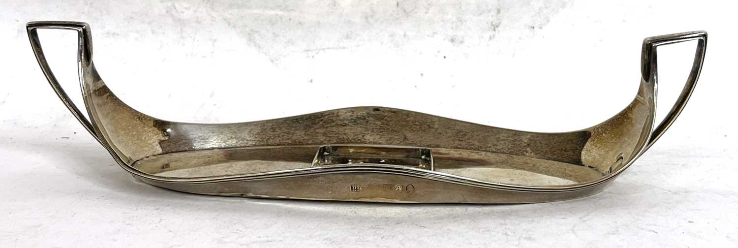 A George III silver boat shaped ink stand with applied reeded border and twin handles, centre ink - Image 2 of 4