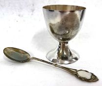 A cased white metal egg cup and spoon, both stamped 800
