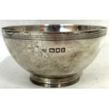 George V silver bowl of circular plain form with reeded border and applied with a reeded collet