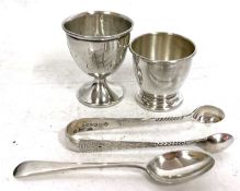 Mixed Lot: Two hallmarked silver egg cups, small pair of silver bright cut sugar tongs together with