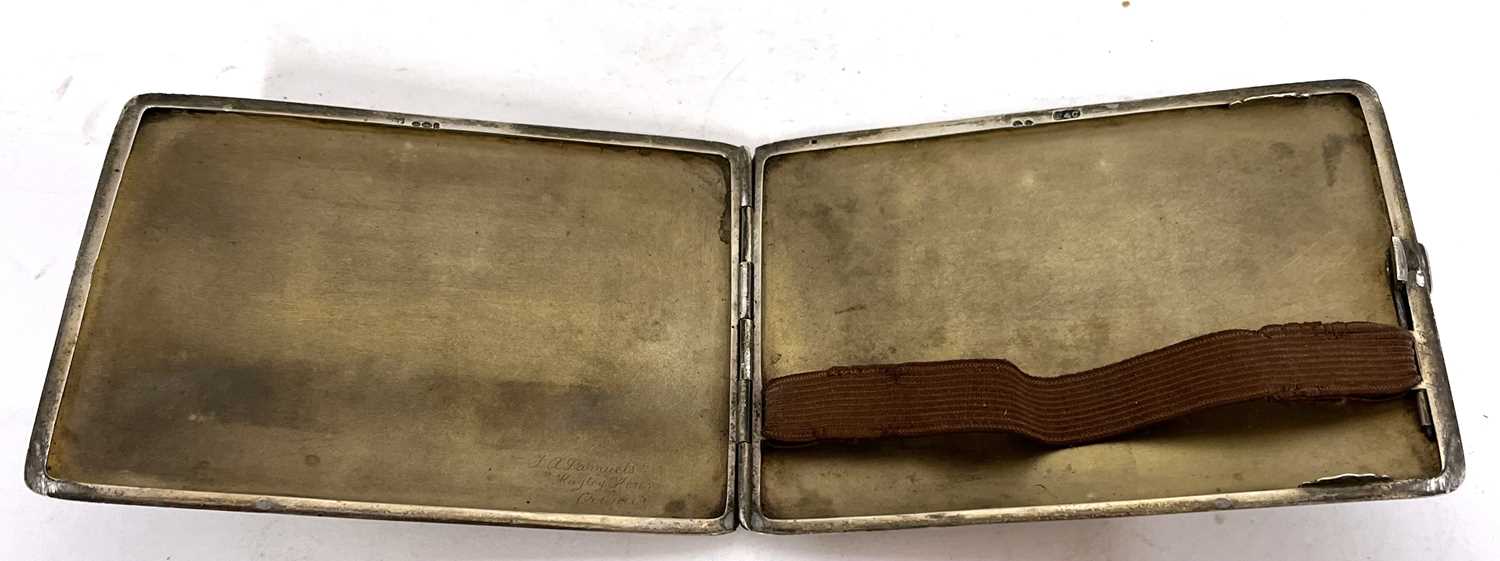 A white metal cigarette case of rectangular form with overall engraved banded design, 12 x 8cm, - Image 2 of 2