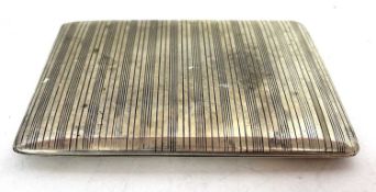 A white metal cigarette case of rectangular form with overall engraved banded design, 12 x 8cm,