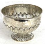 An Edwardian silver pedestal bowl, the body with partial half fluted wrythen design supported on a