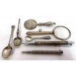 Mixed Lot: Hallmarked silver backed mirror, a white metal handled magnifying glass, a modern pen