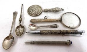 Mixed Lot: Hallmarked silver backed mirror, a white metal handled magnifying glass, a modern pen