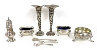 Mixed Lot: A pair of hallmarked silver spill vases with wrythen turned stems on loaded bases,