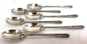 Of Golfing Interest: Six George V teaspoons, the handles with two golf clubs and a golf ball finial,