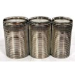 A Russian silver triple coin holder, reeded decorated bodies and beaded rims, standard mark 84,