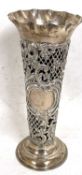 A Victorian tall silver vase of pierced tapering cylindrical form having a flared rim and