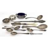 Mixed Lot: A silver preserve spoon, a shell bowled sifter spoon, a silver long handled button