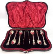 A cased late Victorian set of silver teaspoons and tongs comprising six silver teaspons with