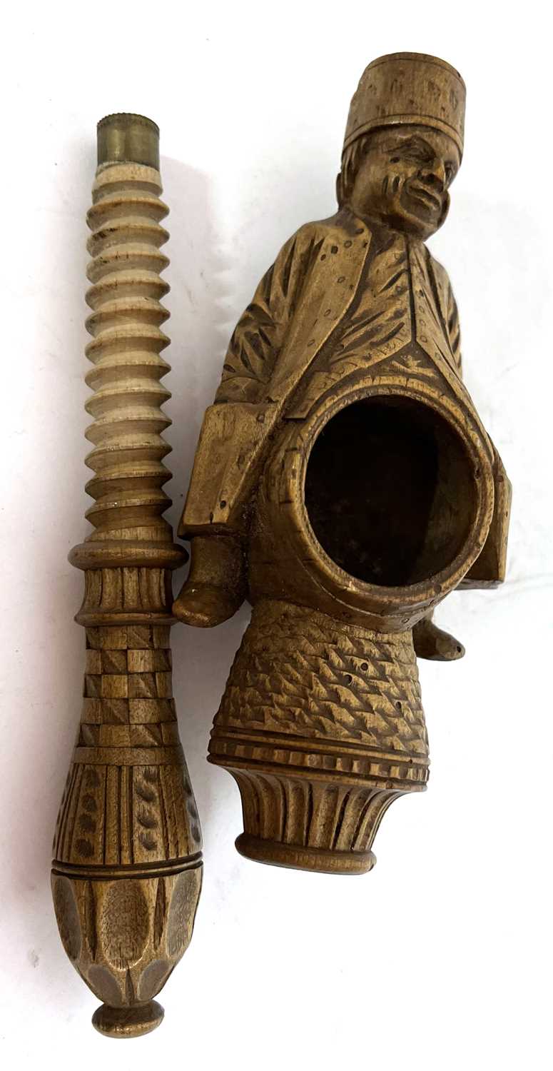 An antique treen box wood nut cracker, a carved figure sitting astride a barrel with screw handle, - Image 8 of 8