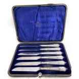Cased set of six silver handled dessert knives, Albany pattern handles, London 1900, Goldsmith &