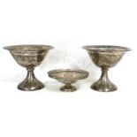 Pair of George V pedestal dishes of plain polished form with geometric pierced border, Birmingham