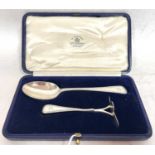 Cased Victorian spoon and pusher, London 1862, maker mark rubbed, both engraved with initials