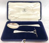 Cased Victorian spoon and pusher, London 1862, maker mark rubbed, both engraved with initials
