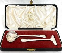 A cased silver child's spoon and pusher, Sheffield 1960/61, makers mark Viners Ltd