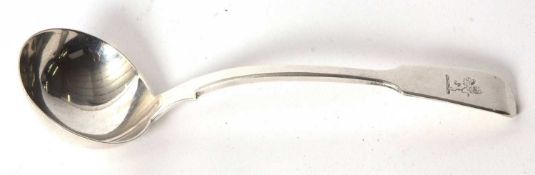 William IV silver fiddle pattern sauce ladle engraved with a crest, hallmarked London 1832, makers