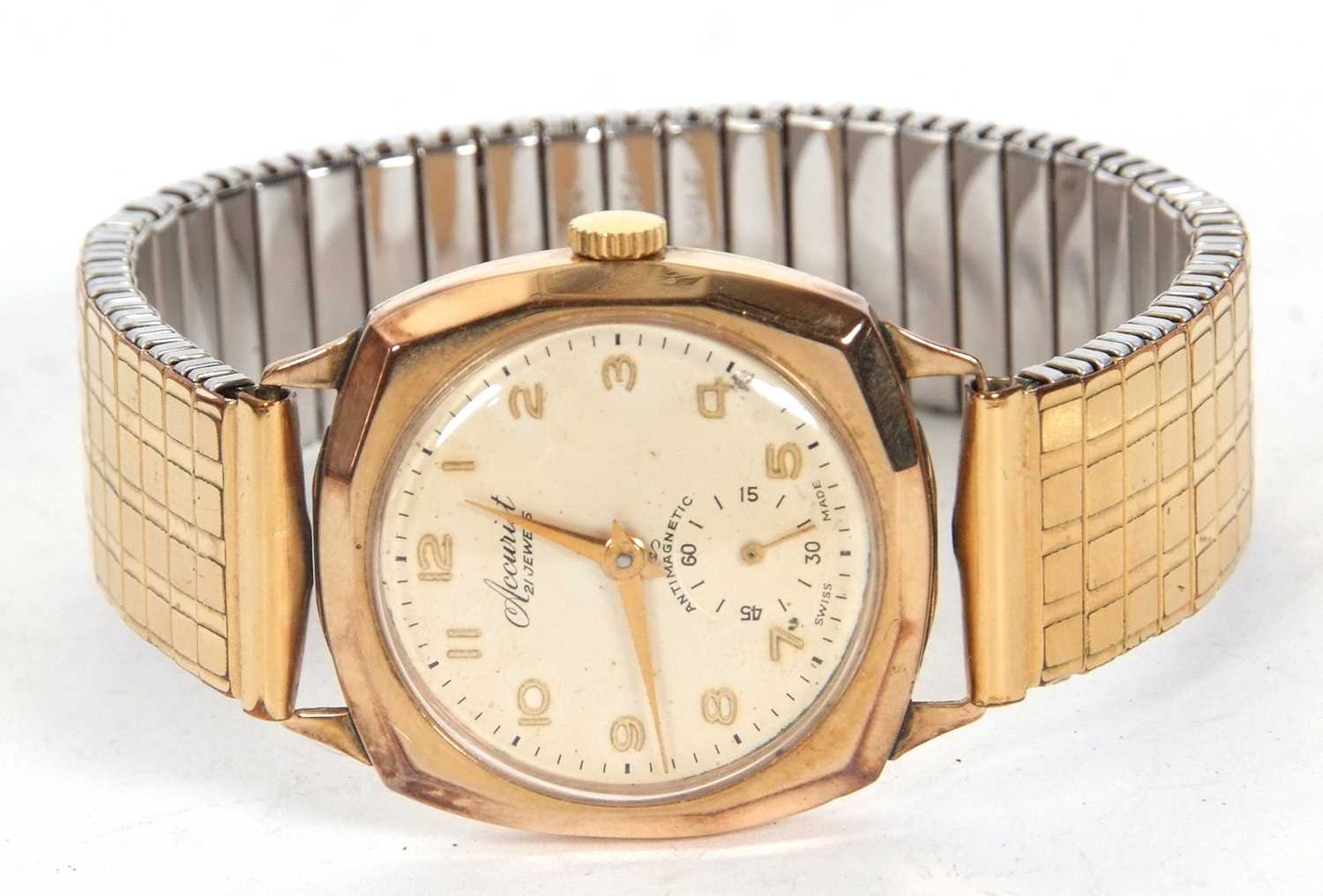 A 9ct gold Accurist gents wristwatch, stamped on the inside of the case back, it has a manually