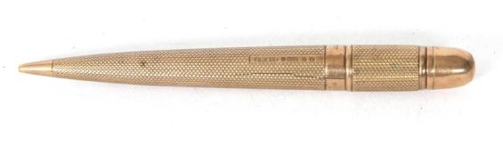 A 9ct gold cased Mordan Everpoint pencil circa 1940, engine turned barrel and engraved one side with