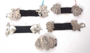 A group of five vintage white metal two part buckles, Chinese, Indian and Siamese examples (5)