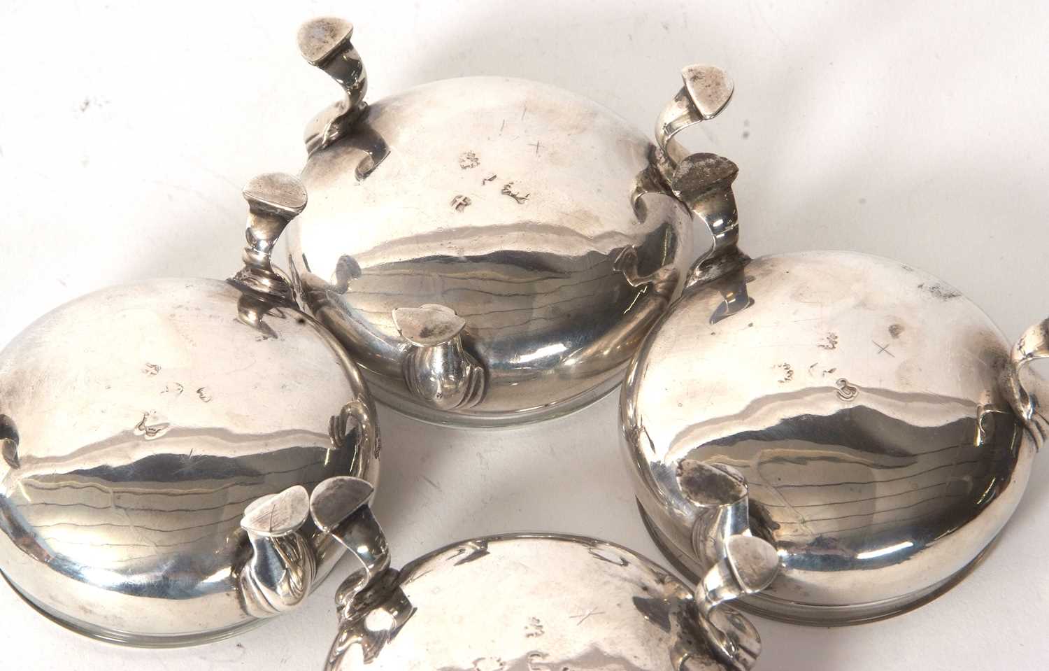 Four George III silver cauldron salts, raised on three hoof feet with later clear glass liners, - Image 5 of 5