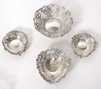 Mixed Lot: A Victorian silver shallow dish ornately chased and pierced with foliate scrolls etc,