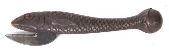 Late 19th Century cast iron fish shaped can opener in the form of a sardine, 13.5cm long