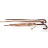 Mixed Lot: A Burberry umbrella, together with two vintage walking sticks (a/f)