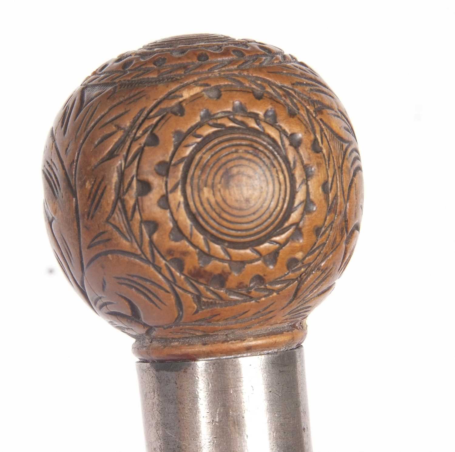 An antique walking stick with ball finial, carved with foliate and geometric designs with a metal - Image 9 of 10