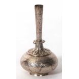 An Eastern white metal spill vase of tapering form with a slender neck to a bulbous body, chased and