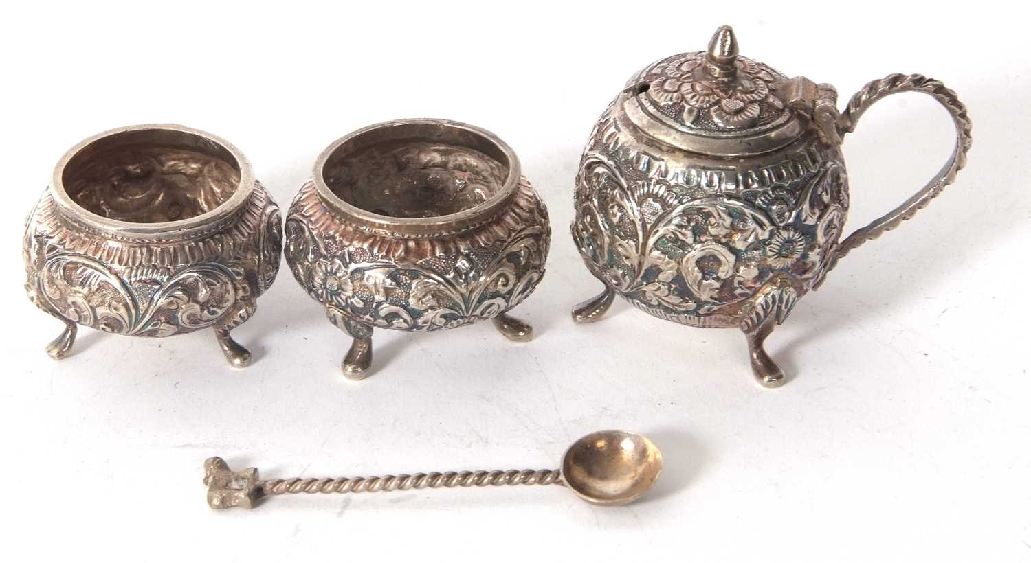 An antique Indian kutch silver three piece condiment set comprising of two open salts and a hinged - Image 2 of 2