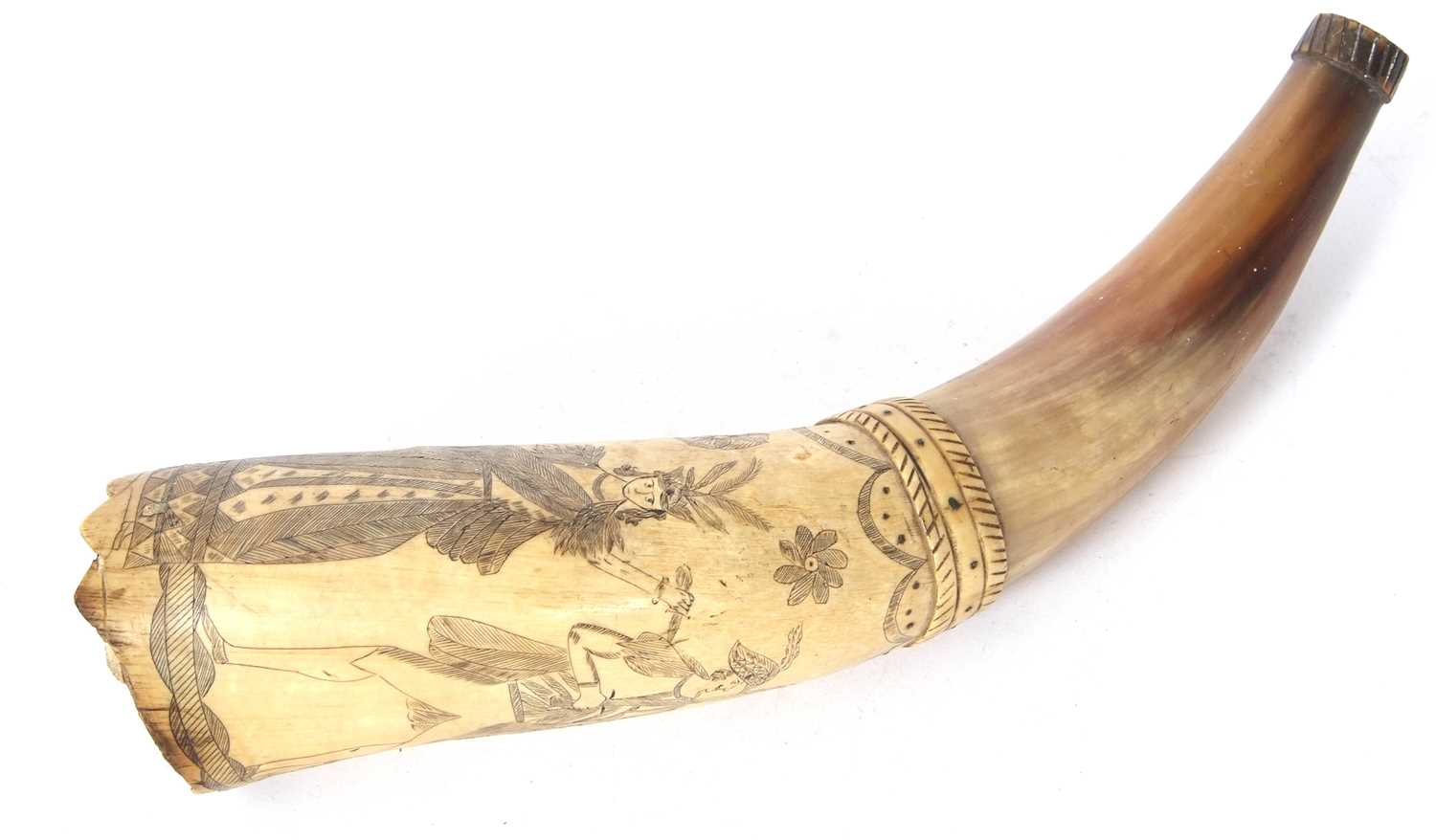 An early 19th Century scrimshaw decorated powder horn, the cow horn decorated with European