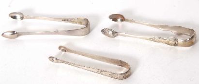 Pair of large Victorian Scottish sugar tongs with shell bowls, Edinburgh 1863 together with two
