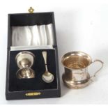 A cased silver Christening egg cup and spoon, presentation engraved and hallmarked Birmingham