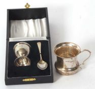 A cased silver Christening egg cup and spoon, presentation engraved and hallmarked Birmingham
