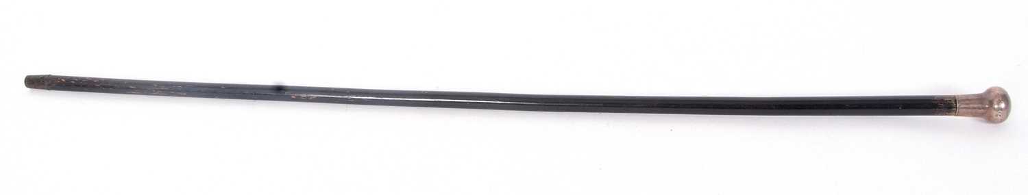 An early 20th Century black painted tapering cane, hallmarked silver handle for London 1920, - Image 2 of 4