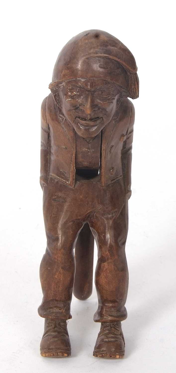 A vintage Black Forest nut cracker, circa 1930 of figural form showing a seated older man with a - Image 6 of 7