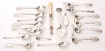 A group of silver to include ten various salt, mustard and caddy spoons, five teaspoons and two